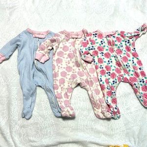 Infant 0-3 month sleeper onesies.